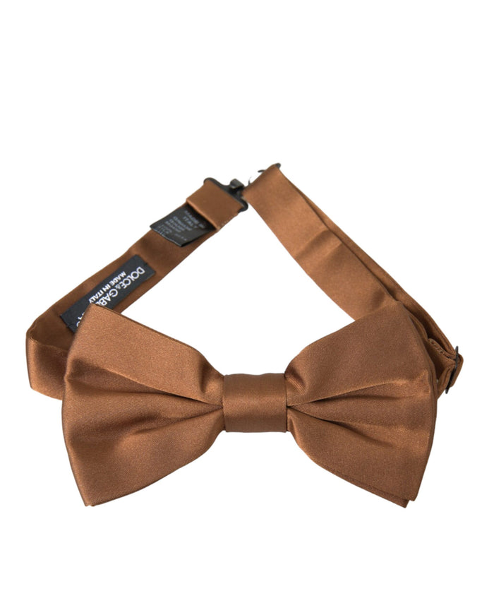 a brown bow tie on a white background