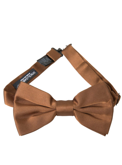 a brown bow tie on a white background