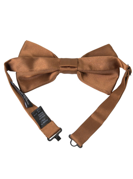 a brown bow tie on a white background