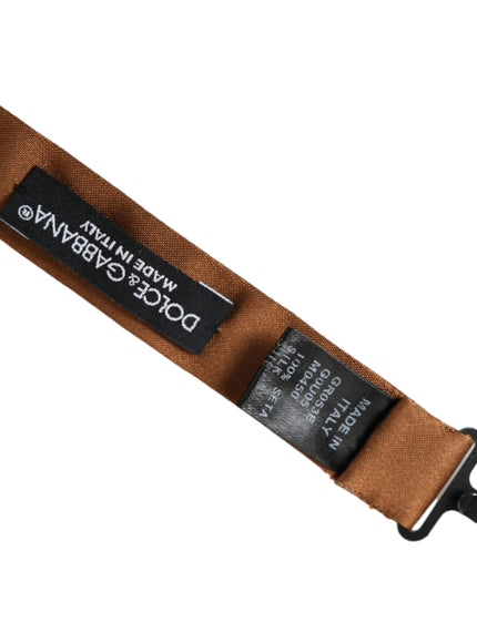 a brown belt with a black label on it