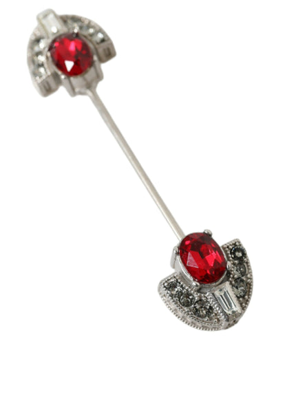 a pair of red and white diamond earrings