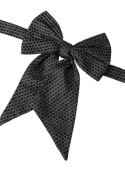 a black and white bow tie on a white background