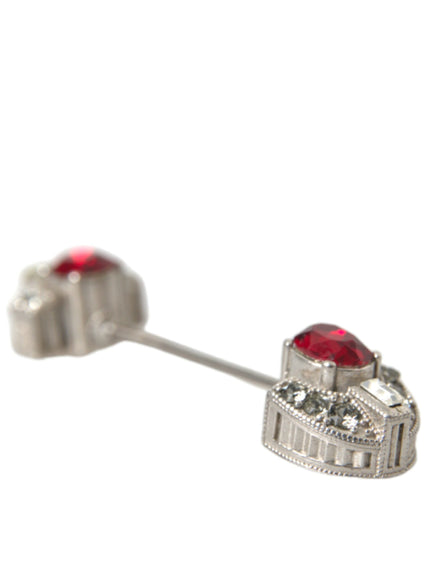 a pair of red and white diamond earrings