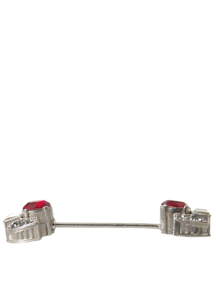 a pair of red and white diamond earrings