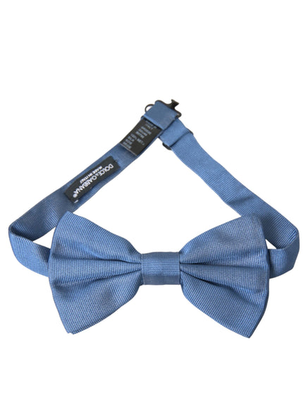 a blue bow tie on a white background