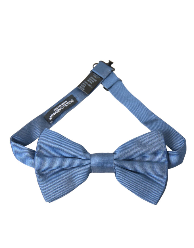 a blue bow tie on a white background