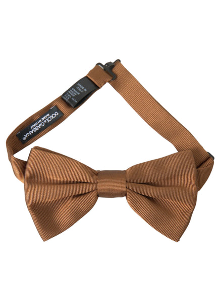 a brown bow tie on a white background