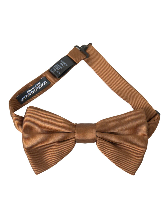 a brown bow tie on a white background