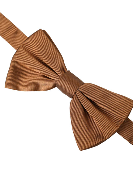 a brown bow tie on a white background