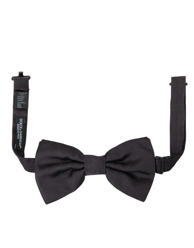 a close up of a bow tie on a white background