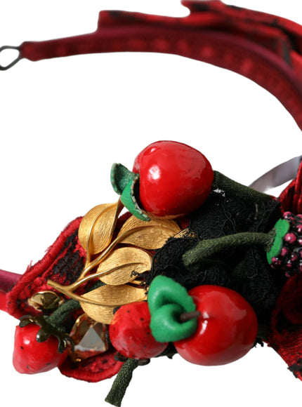 Detail of cherries and gold leaves on red hairband