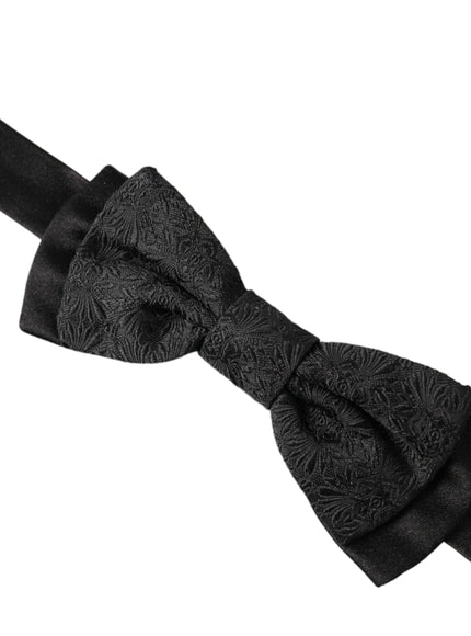 a black bow tie on a white background