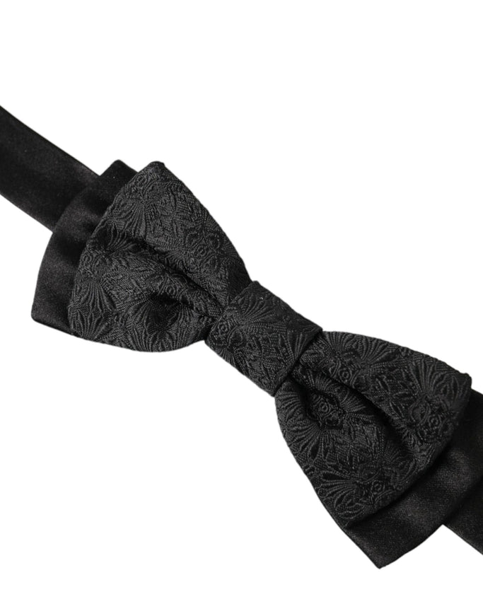 a black bow tie on a white background