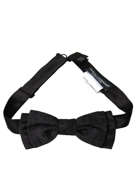 a black bow tie on a white background