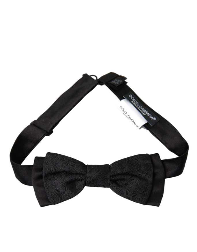 a black bow tie on a white background