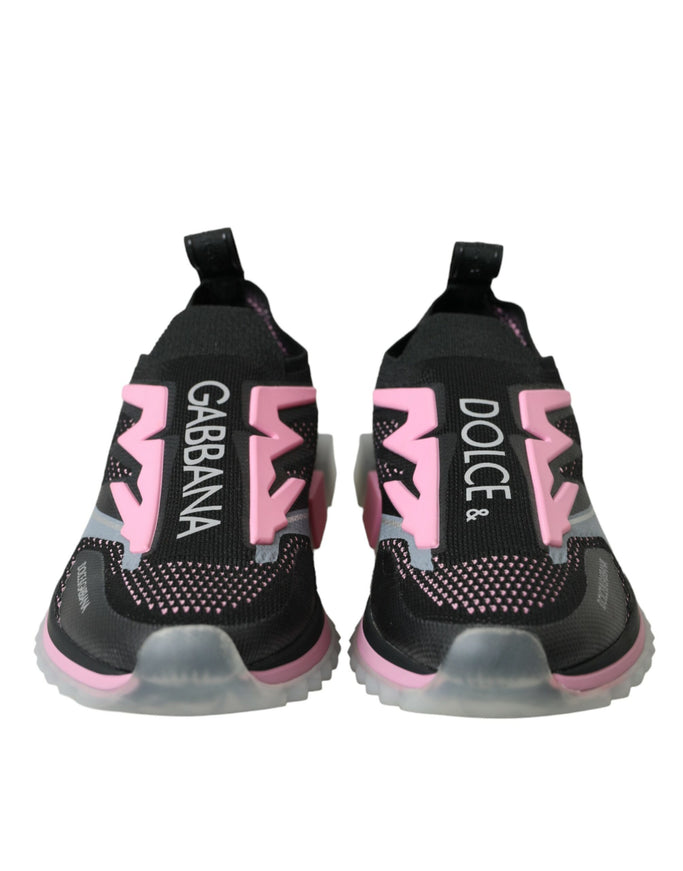 a pair of black and pink sneakers