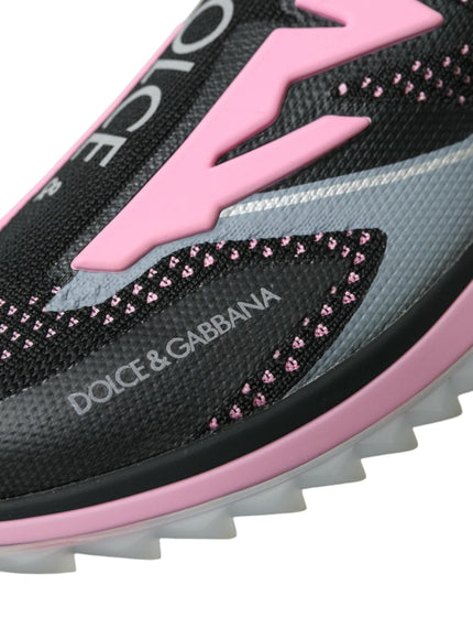 a close up of a shoe with pink accents