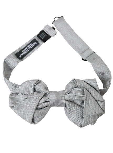 a gray bow tie on a white background