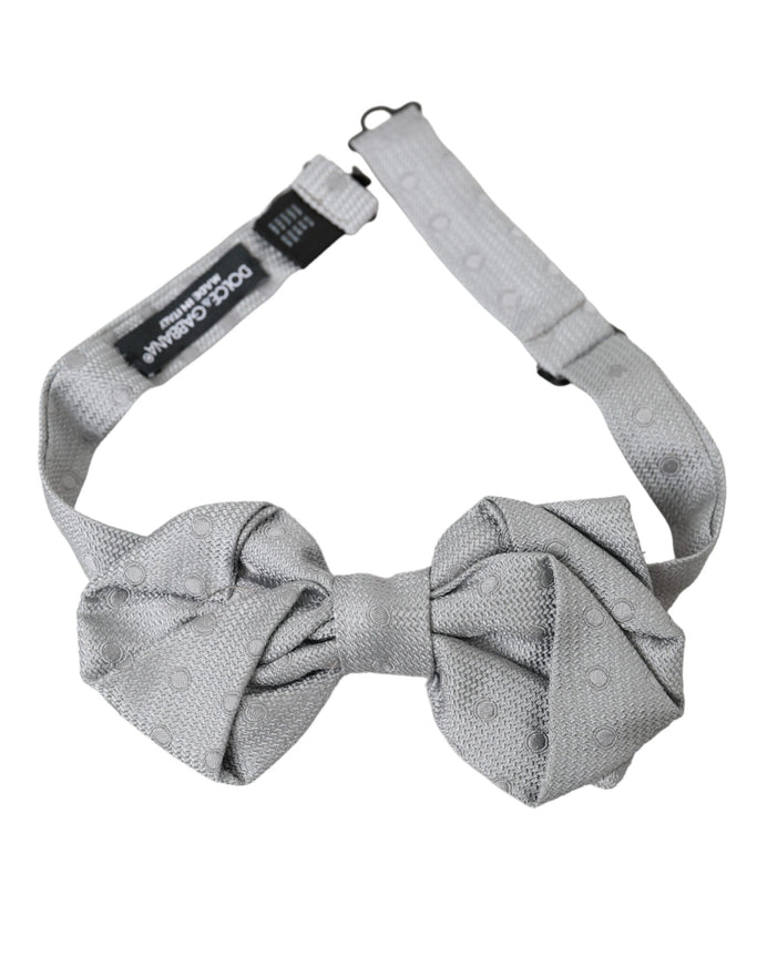 a gray bow tie on a white background