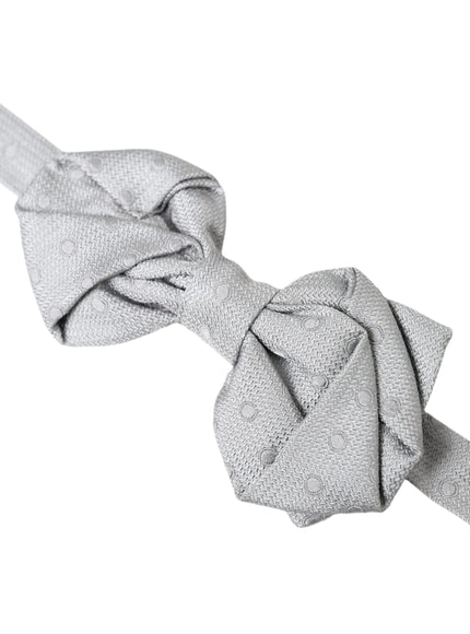 a gray bow tie on a white background