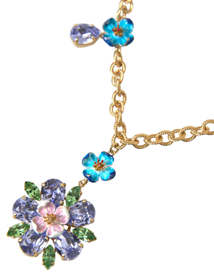 a necklace with flowers and leaves on it