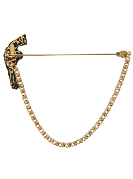 Back view of Dolce & Gabbana revolver gun brooch