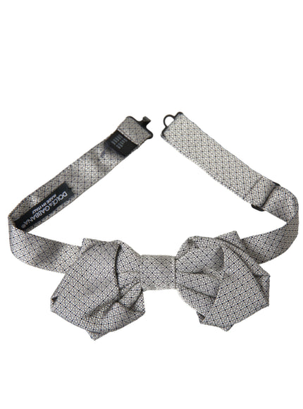 a tie with a bow tie on a white background