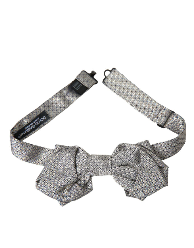 a tie with a bow tie on a white background