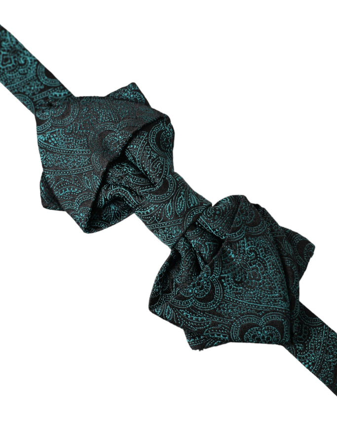 a black tie with a green paisley pattern on it