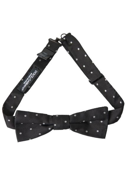 a black bow tie with white polka dots