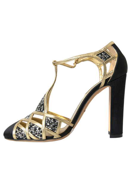 a pair of black and gold high heels