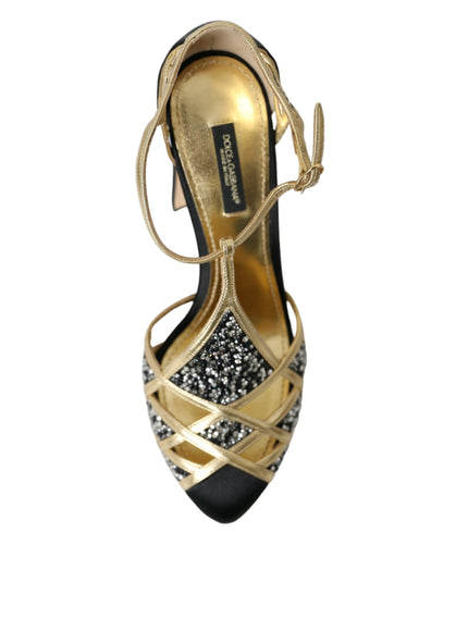 a woman's shoe with gold and black heels