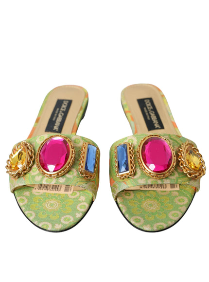 a pair of shoes with colorful stones on them