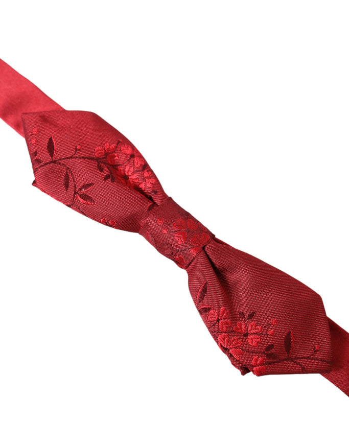 a close up of a red tie on a white background