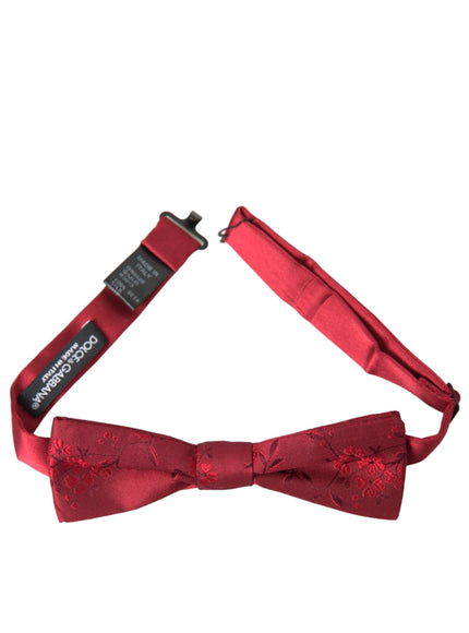 a red bow tie on a white background