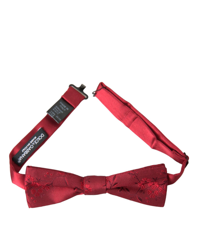 a red bow tie on a white background