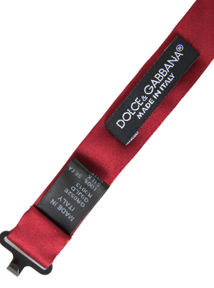 a red strap with a black tag on it