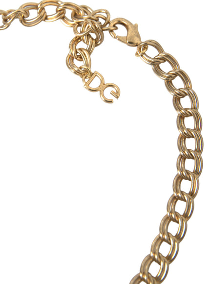 a close up of a gold chain on a white background