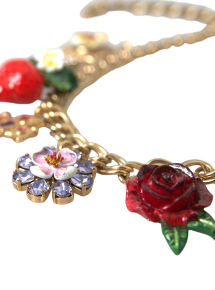 a close up of a necklace with flowers on it