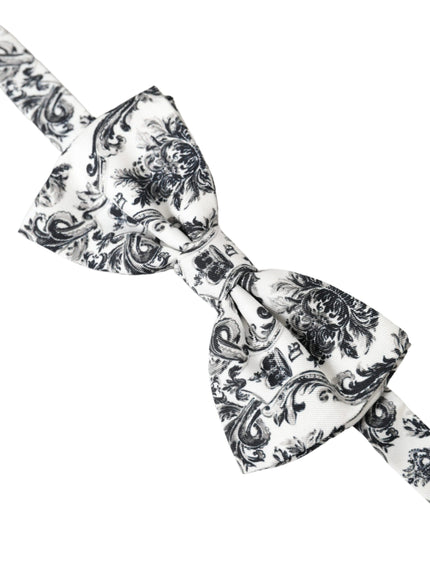 a black and white bow tie on a white background