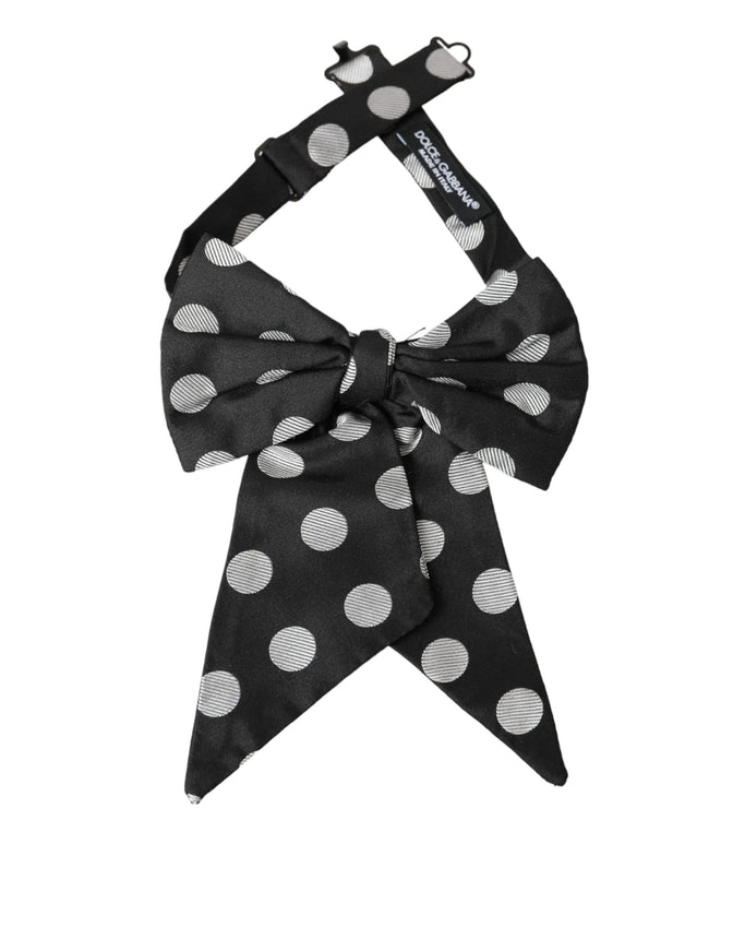 a black and white polka dot bow tie