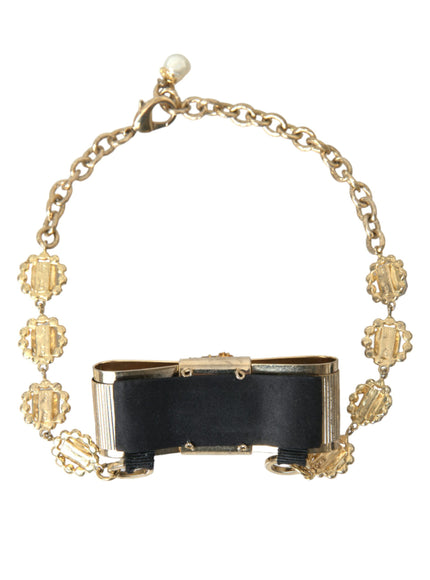 a black and gold chain bracelet with a clasp