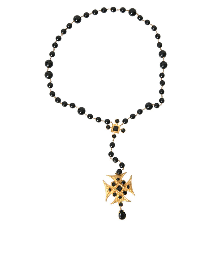 a black beaded necklace with a gold star on it