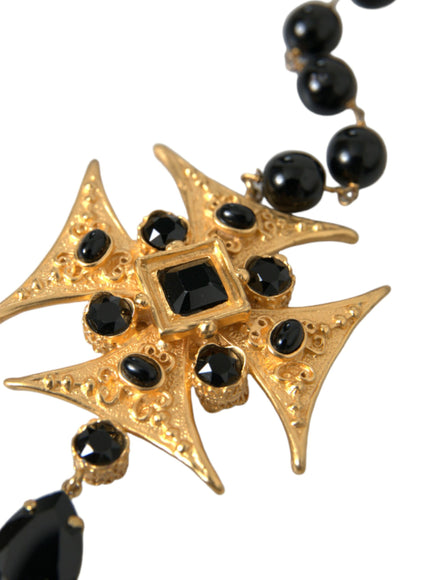 a black and gold necklace with a star design