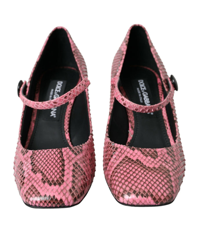 a pair of pink shoes with a snake skin pattern