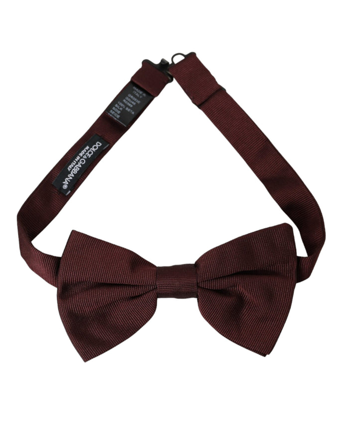 a brown bow tie on a white background