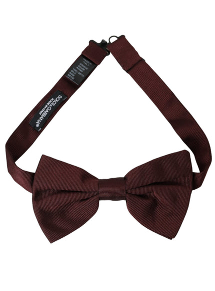 a brown bow tie on a white background