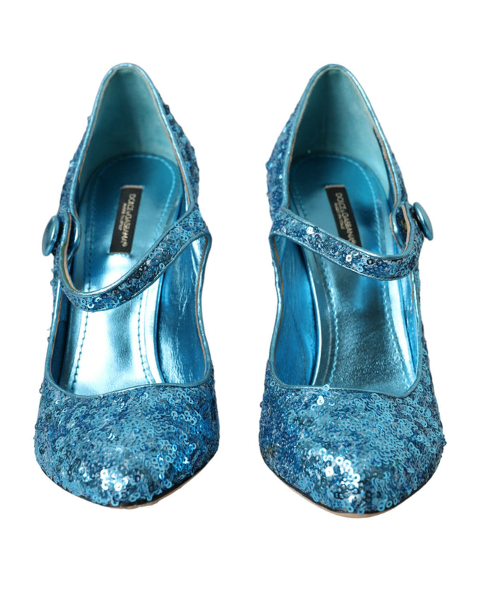 a pair of blue high heels with a bow