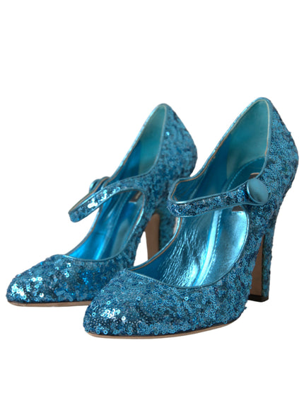 a pair of blue high heeled shoes on a white background