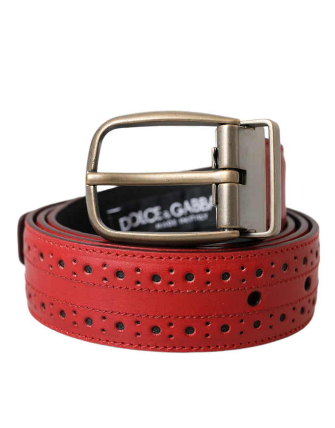 a red belt with holes and a metal buckle